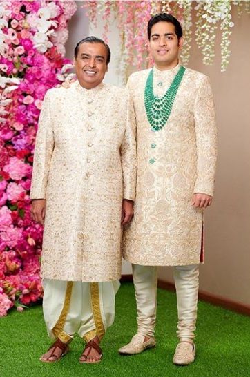 Ambanis in Off White sherwani. Hand embroidery is done all over.